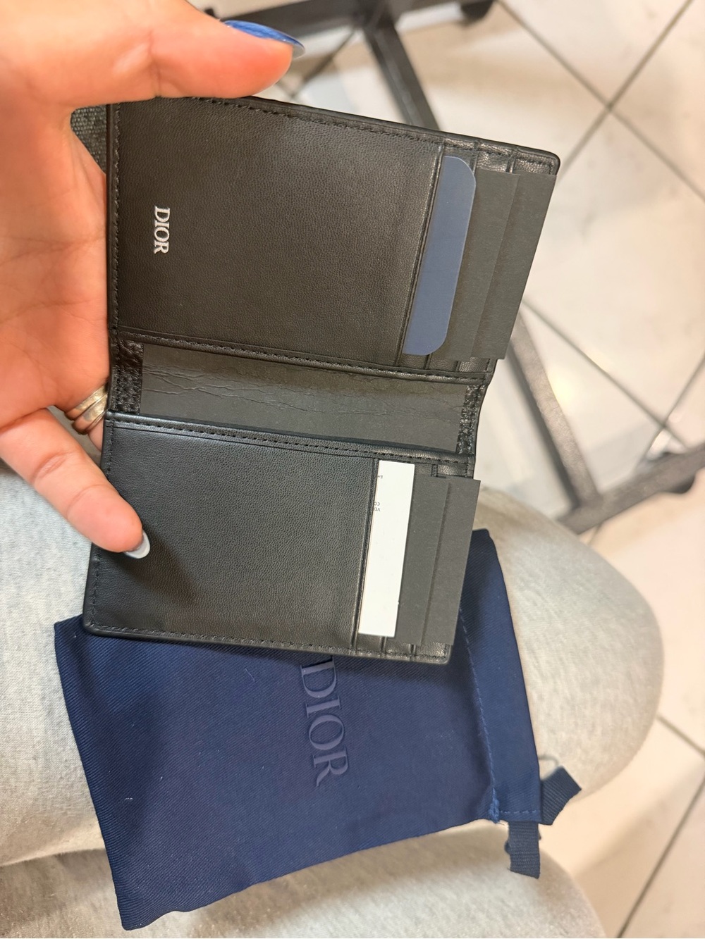 100% authentic .Black Leather Bi-Fold Card Holder with Navy Pouch
